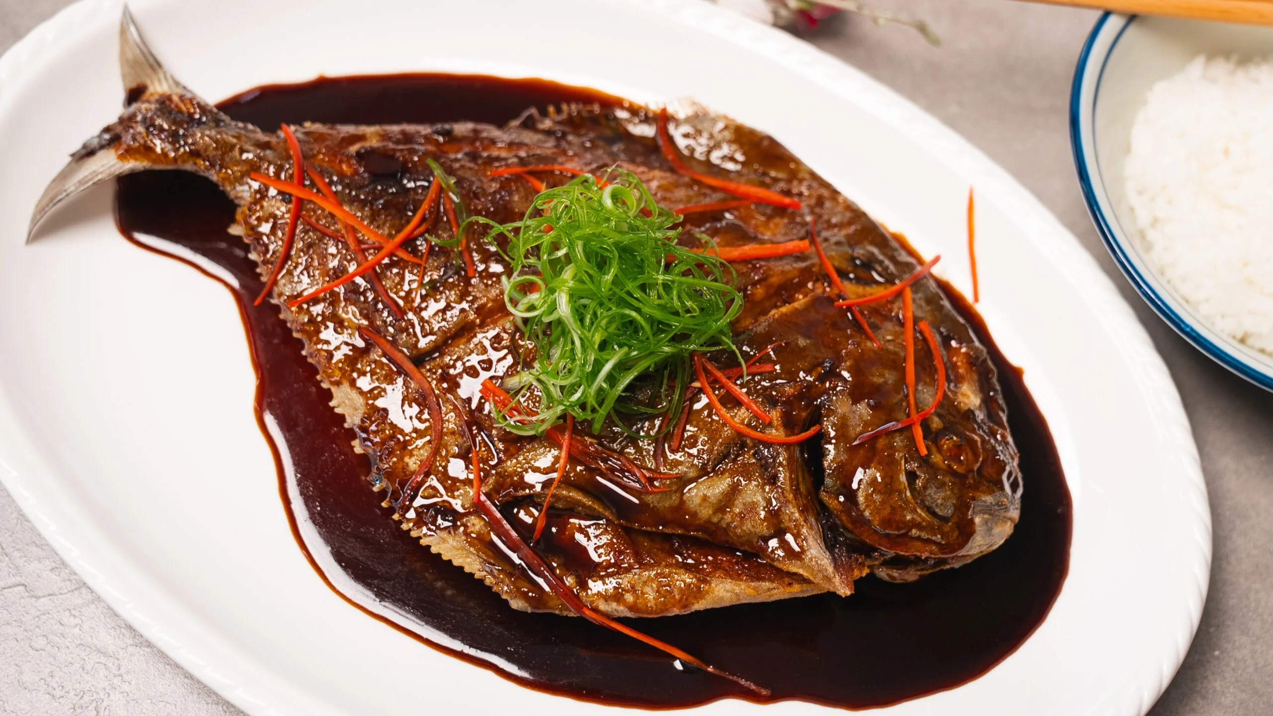 pan fried line fish with a ginger scallion sauce